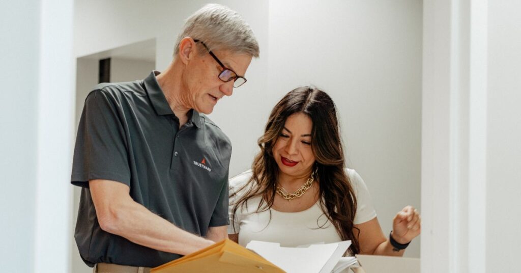 Nonprofit advisor reviewing financials with executive director